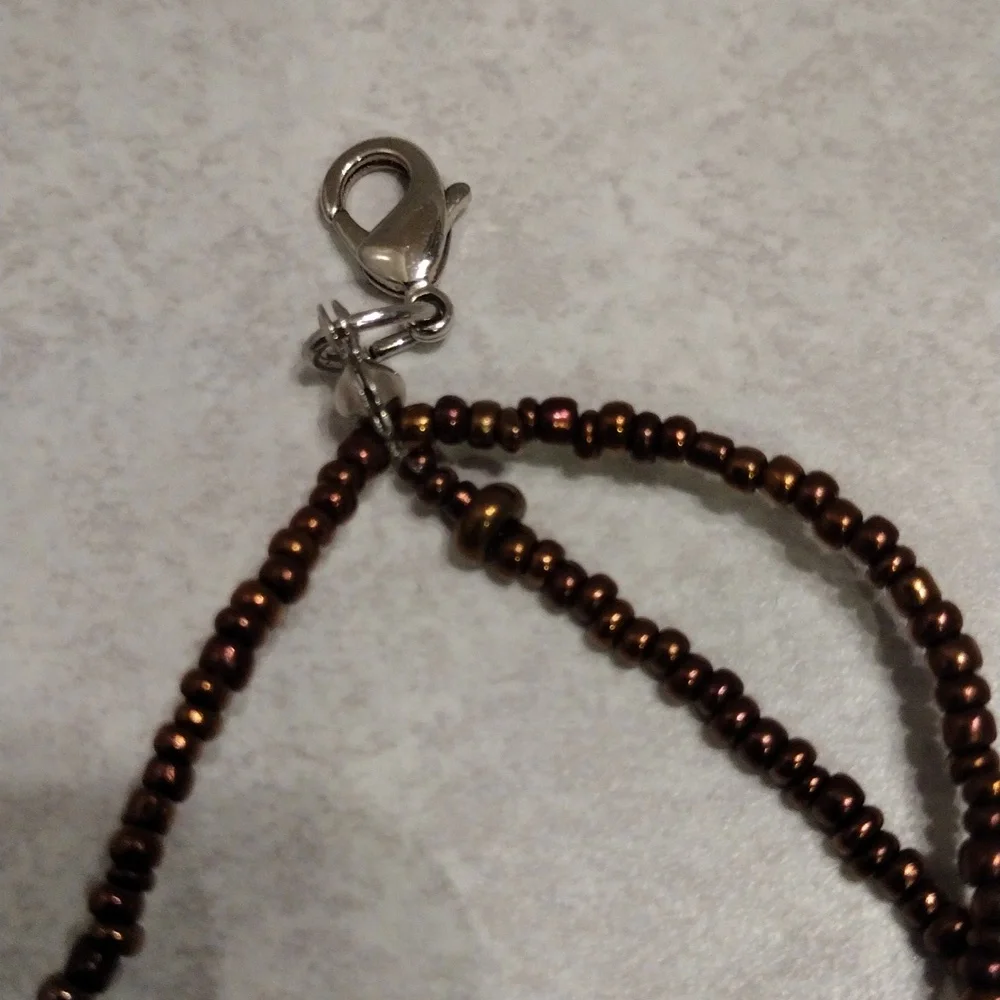 Beautiful triple strands of shell's and beads necklace. - Picture 2 of 4